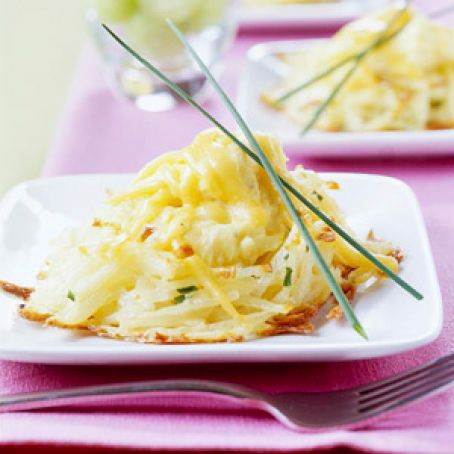 Scrambled Eggs in Potato Nests