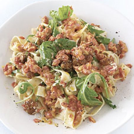 Fresh Tagliatelle with Sausage, Red Peppers, and Arugula