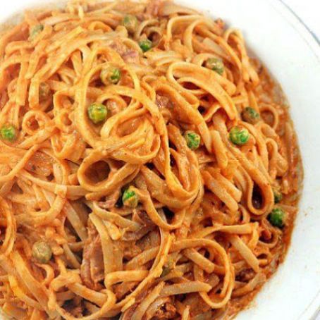 Creamy Tomato Parmesan Linguine with Peas and Prosciutto