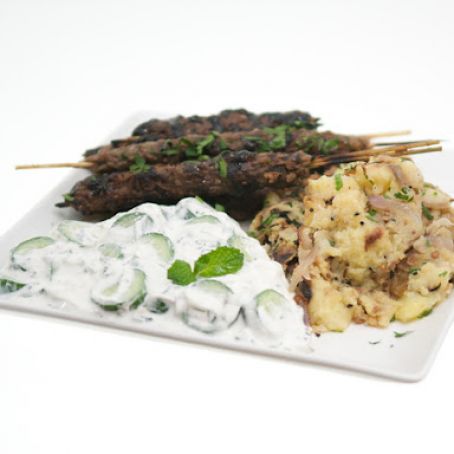 Ground Lamb Kofto Kebabs with Pomegranate Glaze, Bengali-Spiced Potatoes & Persian Cucumber Raita